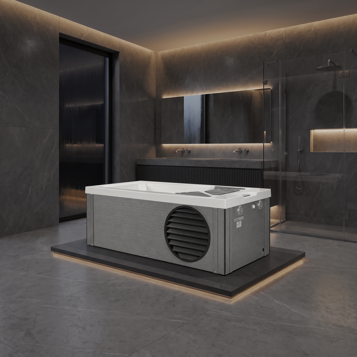 A modern freestanding rectangular hot tub cold plunge with a white top and gray side housing, placed on a raised black platform in a contemporary dark gray bathroom with a glass shower enclosure and built-in lighting.