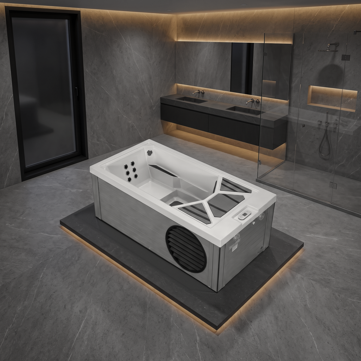 A modern white and gray freestanding hot tub cold plunge with integrated seating and deck grates, shown in a contemporary bathroom setting with gray stone walls, a glass shower enclosure, and a vanity in the background.