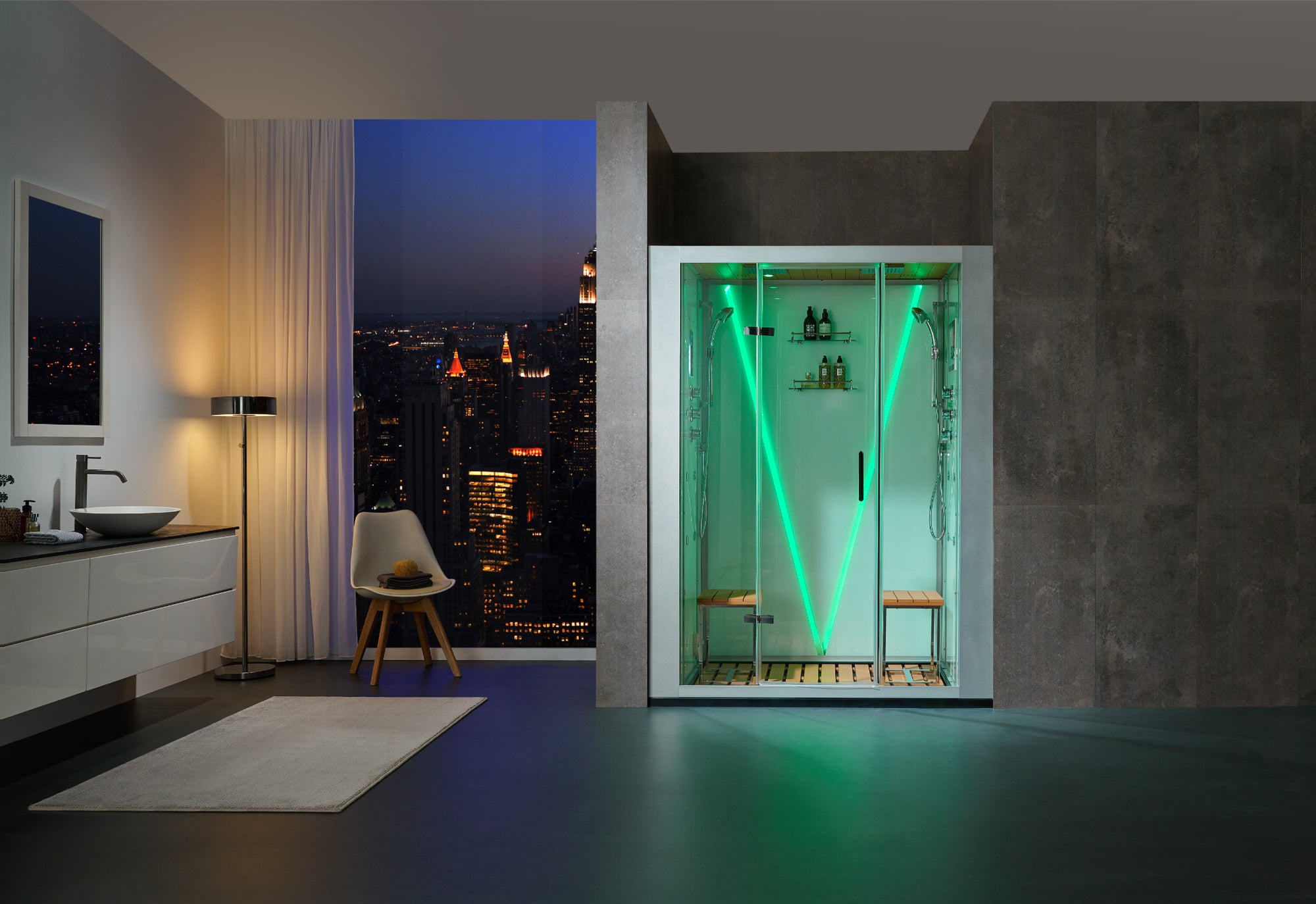 A modern walk-in shower enclosure with green LED lighting, set in a contemporary bathroom with a large window overlooking a city skyline at night.