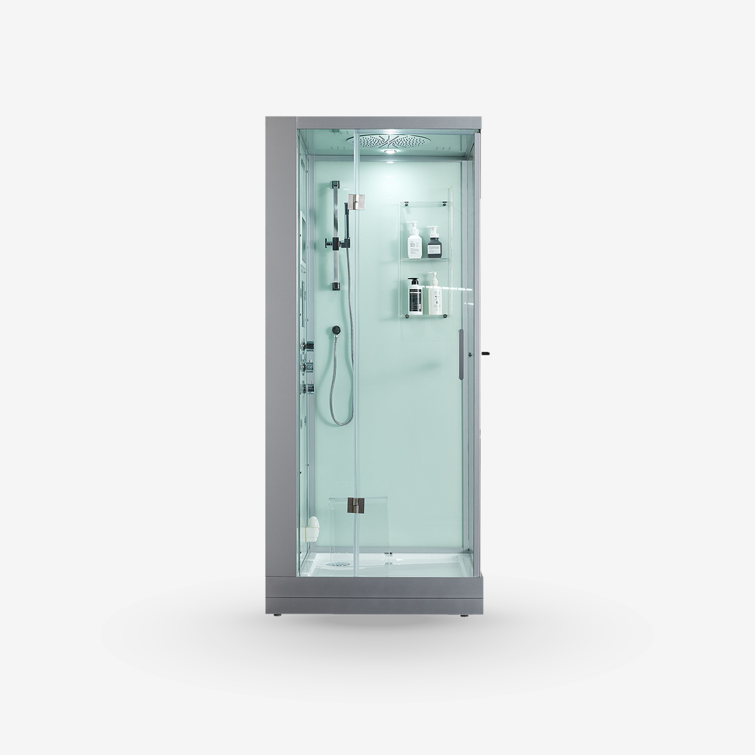 A modern freestanding walk-in shower enclosure with a gray frame, clear glass panels, and an illuminated interior showing a shower head, handheld shower, and shelving.