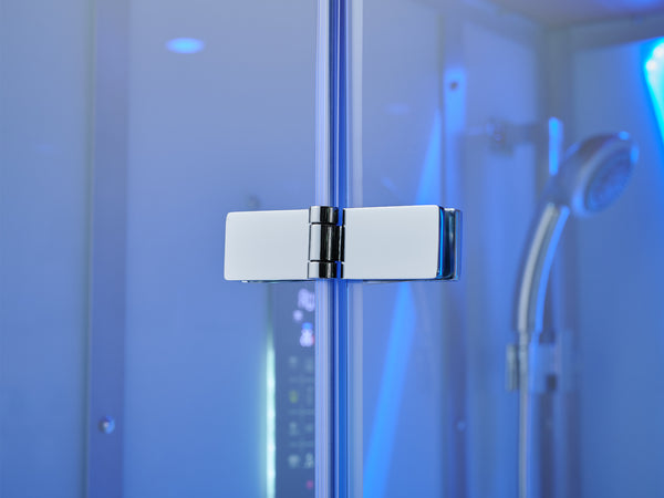 A close-up of a modern chrome shower glass door hinge, with a blurred blue-lit shower interior in the background.