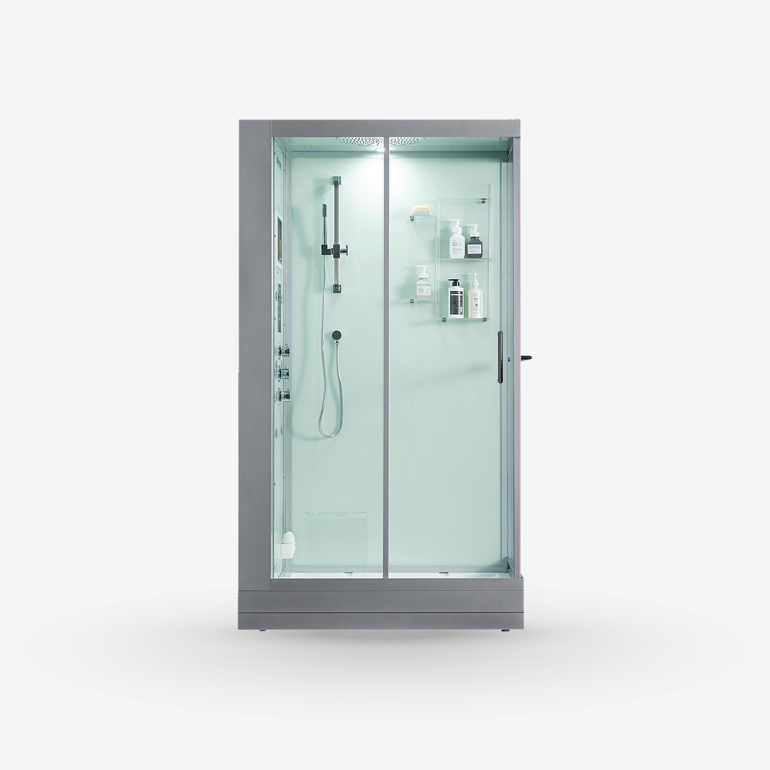 A modern walk-in shower enclosure with a gray metal frame and frosted glass doors, shown on a clean light gray background. The interior features a white tiled wall, a mounted shower head, and a small shelf holding toiletry bottles.