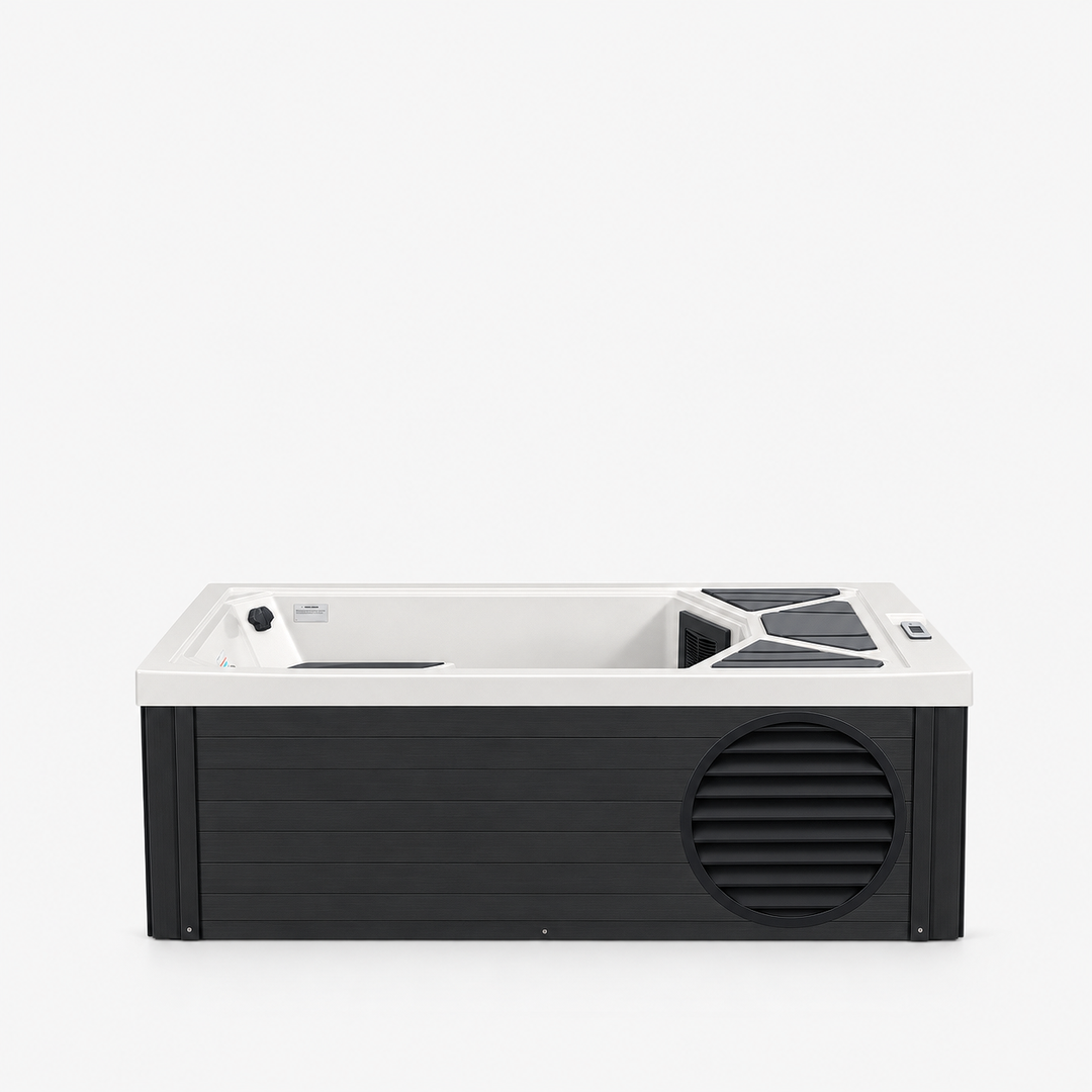 A modern rectangular cold plunge with a white interior and a black exterior featuring a large vent on the front right side, shown against a plain white background.